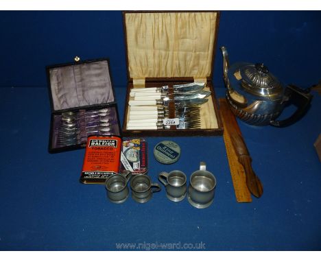 A set of fish knives and forks, a plated teapot, pewter mugs, cutlery, old tins, two rulers.