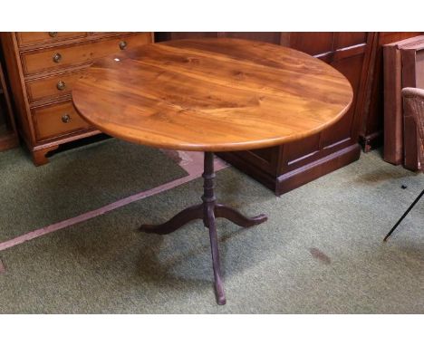 Circular plank topped table with cast iron tripod base 