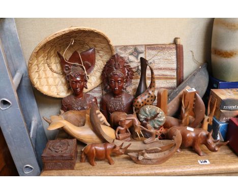 Good collection of assorted Wooden carved ethnographic items to include Balinese Busts, African animals and a Aboriginal desi
