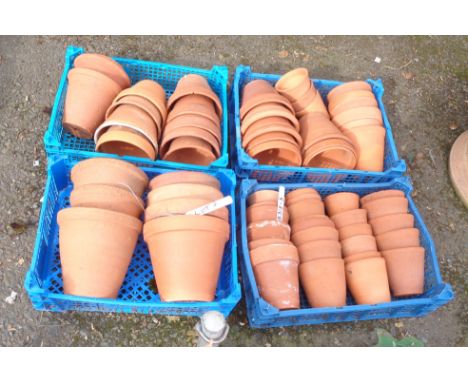 Four crates containing vintage terracotta garden pots - various sizes