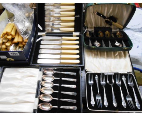 A quantity of cased and loose silver plated cutlery including a grapefruit set, etc.