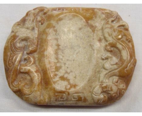 A Chinese carved butterscotch jade ink stone