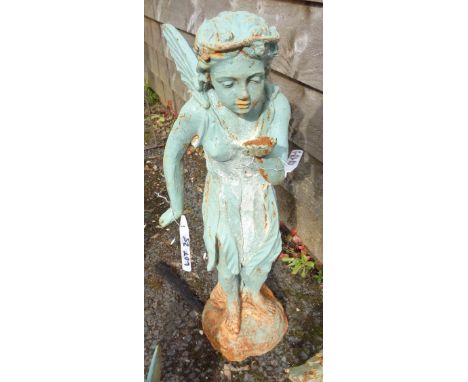 A cast iron standing garden angel