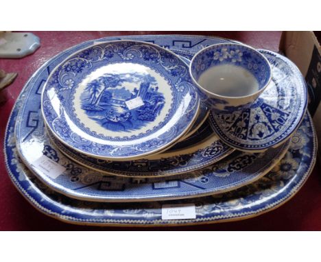 Four graduated meat plates of differing designs and four other blue and white ceramics including Spode Tower pattern sugar bo