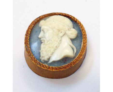 A 1 1/4" antique oval hardstone cameo panel, depicting a profile portrait of a classical male
