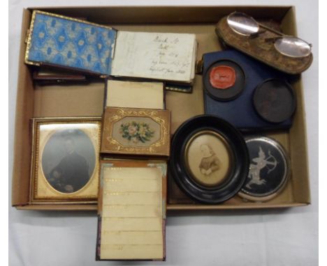 A box of assorted collectables including ambrotype card case, pince nez, leather and embroidered note pad, portrait miniature