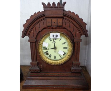 A late 19th Century stained wood cased American shelf clock with Ansonia spring driven gong striking movement