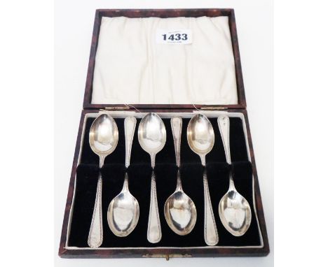 A cased set of six silver teaspoons with bright-cut style decoration