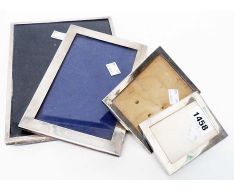 Four silver fronted photograph frames, three with easel backs - various sizes the largest to take 9" X 7"