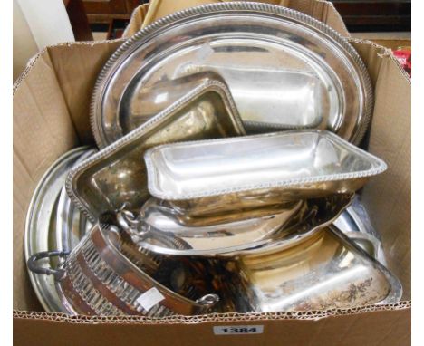 A box containing a quantity of silver plated items including entree dishes, trays, etc. 