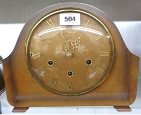 A mid 20th Century stained walnut effect cased mantel clock with Smiths eight day chiming movement