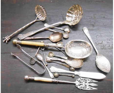 A collection of good quality silver plated cutlery items including strainer ladles, muffin fork, etc.