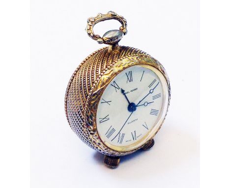 A Daniel Perrett novelty miniature alarm clock with musical movement