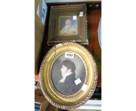 An antique gilt framed oval small profile portrait of a gentleman - sold with another - various condition