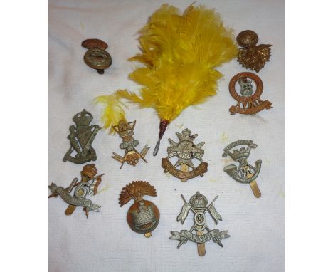 Ten British Army cavalry and light infantry cap badges including XV/XIX Hussars, Inniskilling Fusiliers, 16th/5th Lancers, Ro