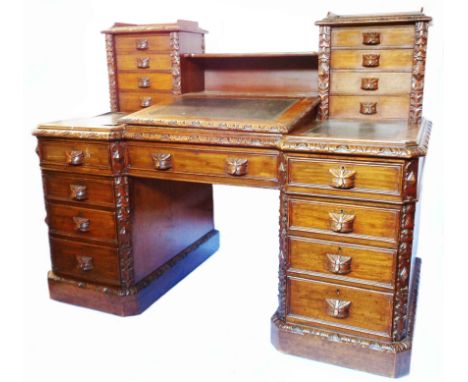 A 5' old polished oak twin pedestal desk with eight flanking bracket locking drawers and shelf to top, central lift-top ink c