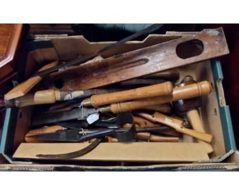 A box of tools including wood turning skew chisel, gouges, sharpeners, lignum vitae mallet, large Archimedes drill, etc.