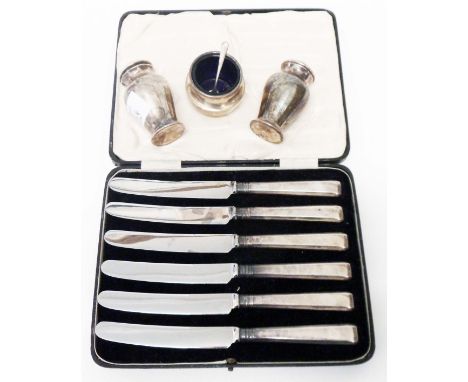 A pair of silver pepperettes and an associated salt - sold with a cased set of six silver handled dessert knives