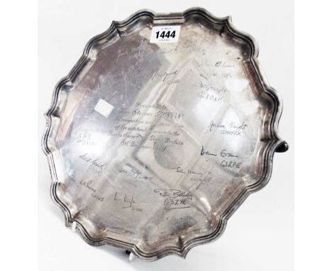 A 12" diameter silver salver with shaped cast rim and extensive presentation text and signatures relating to the Radio Societ