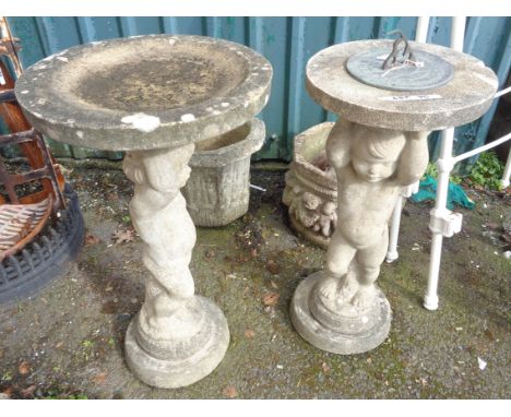 A concrete bird bath - sold with a sundial