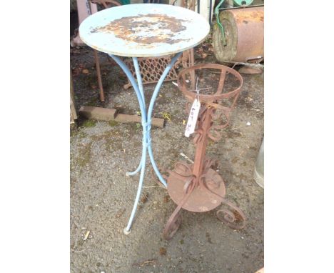 Two wrought metal garden stands