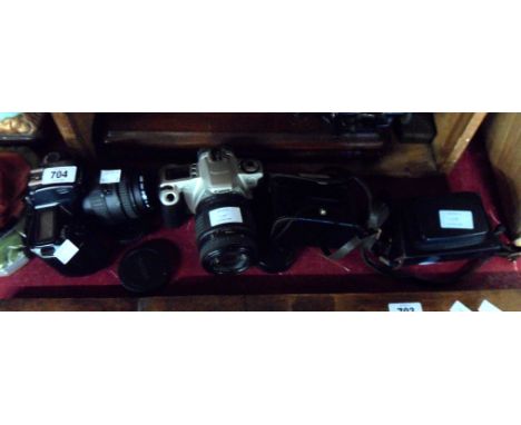 A Canon EOS 100 35mm camera, a Canon EOS 700 35mm camera - sold with two Kodak cameras