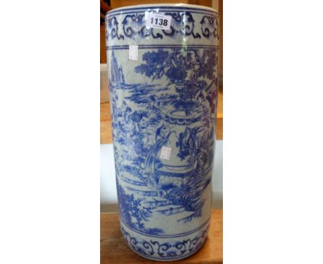 An Oriental blue and white stick stand