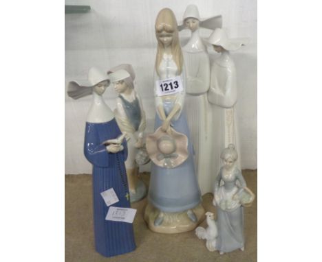 Two Lladro nuns, a Nao figure and two similar