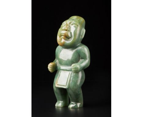 A jade figure of a standing man Mexico, 19th century . . Cm 21,00.