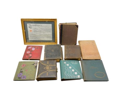 Edwardian photograph album, lithographed pages and contents of family photographs, two other similar albums, scrapbook, five 