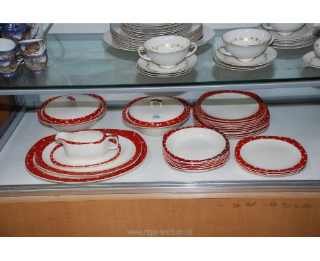 A 'Style Craft' by Midwinter part dinner service in red and white polka dot pattern to include; five dinner plates, five side