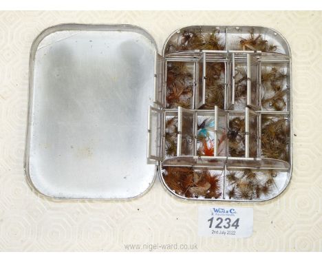 A 3/4 size vintage Wheatley alloy Dry Fly Box and contents of a good quantity of dry flies, various designs.