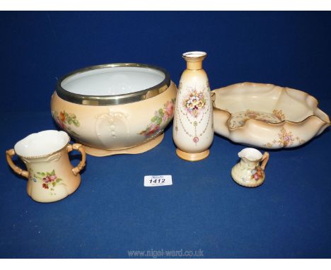 A Royal Worcester blush ivory two handled cup (reg no. G1058) and miniature jug (reg no.1067) with floral detail, together wi