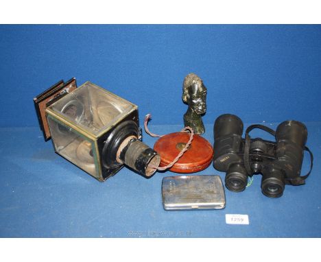 A pair of 20 x 50 Sakura binoculars, a leather bound 'John Rabone &amp; Sons Birmingham' metal tape measure measuring up to 1