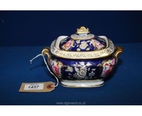 An attractive Coalport porcelain sucrier, circa 1820, painted with flowers against a blue ground and highlighted in gold;  th