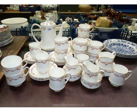 A good quantity of Royal Standard tea/coffee service including cups, saucers, plates, coffee pot, 3 milk jugs, 3 sugar bowls,