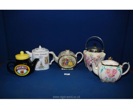 Four Teapots including Sadler, Marmite and Seven Wonders of The World and a Carltonware biscuit barrel.