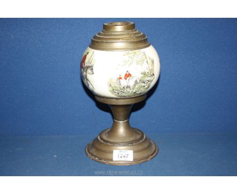 A Victorian Oil Lamp base with pottery reservoir decorated with prints of the hunt, 11' tall.