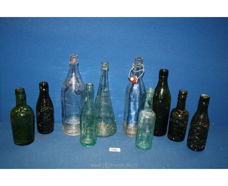 A quantity of bottles to include Schweppes with Royal Crest, Ind Coop, R. Wiggins 'Grey Friars', Corona, Walter T. Southam 'O