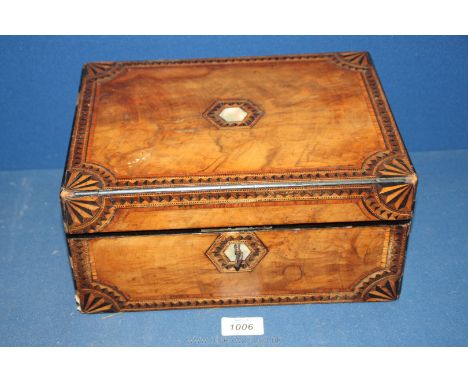 A Walnut 1920's writing slope with mother of pearl inlay to centre and inlaid details to edges, with key. Inside a/f. 12" x 9