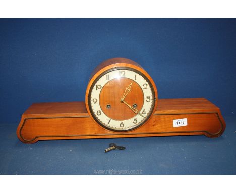 A mantle Clock by VEB Feinmechanik Sonneberg, type 112613, with key, 22 1/2" wide x 5 1/2" deep 8 1/2" tall.
