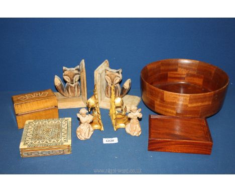 A large mixed wood fruit bowl (10" diameter), playing card box, Mahogany slide lid box, a box inlaid with bone, pair of carve