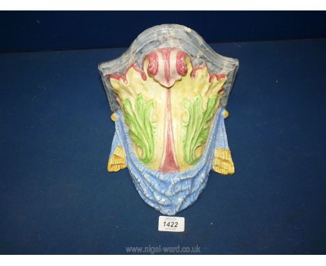 A large 19th Century Majolica ceramic wall bracket in bold colours and elaborate shape, possibly continental, 11" tall, some 