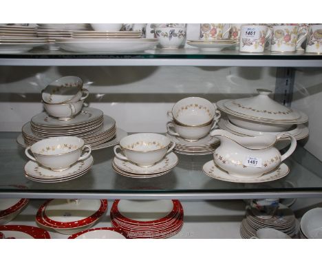 A Royal Doulton 'Citadel' six setting dinner service in cream with gilt leaf pattern and rims to include; two veg tureens, so