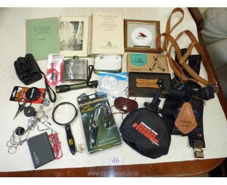 A quantity of angling items including a small leather Flymate, XL Kuny's braces, two multi tools, fishing book 'The Floating 