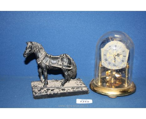 A Koma Anniversary clock under glass dome and a coal ornament of a pit pony.