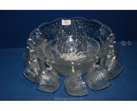A glass Punch Bowl and Cups.