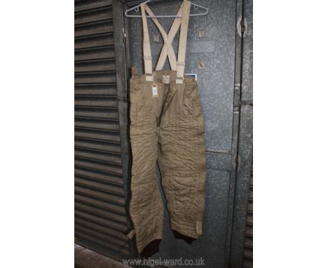 A World War II heated flying Trousers with coils sewn into the fabric and with braces, 24 volt No.10804 serial no.1231, size 