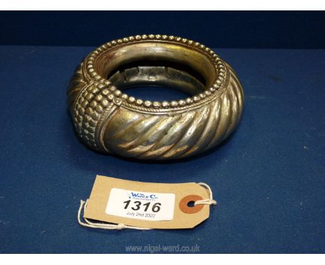 An African Manila white metal slave bangle, circa 1900, 5"diameter.