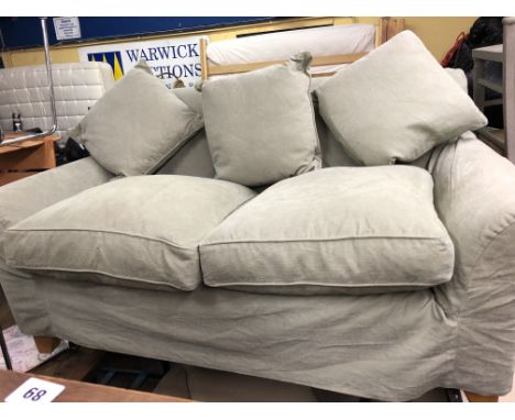 TWO SEATER LINEN SOFA WITH GREEN COVERS AND SCATTER CUSHIONS 